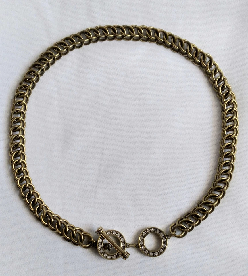 Collar Heidi Daus Cristal Transparente Palanca Malla Redonda Eslabón Tono Bronce 18.5"