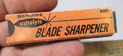 vintage Astrolyte Blade Sharpener stone, in original package, stone has broken