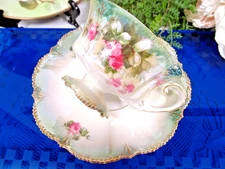 RS PRUSSIA roses tea cup and saucer lustre ware footed German teacup