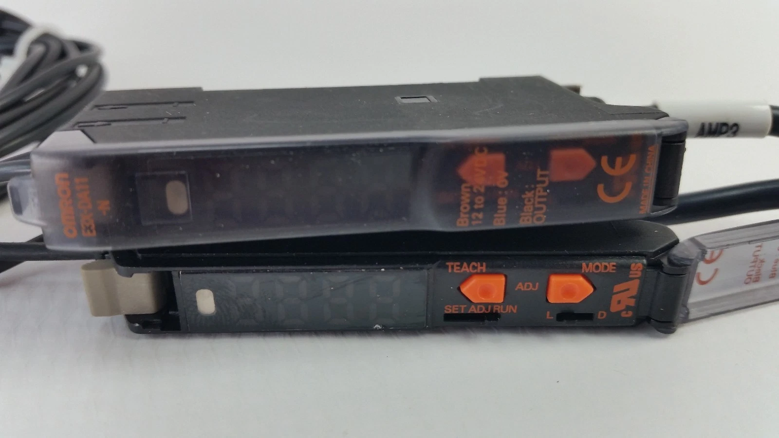 E3X-DA11-N with cover open showing TEACH and MODE keys and SET/ADJ/RUN switch
