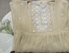 Butter Yellow Dress In Scallop Neck With Transparent Lace Design. Single Pocket