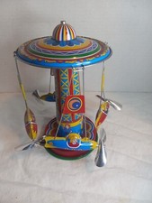 Schylling Reproduction Tin Type Rotating Ride A Rocket Toy 2011 Classic Spins 
