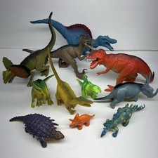 Lot Of 11 Dinosaurs Figurines Multicolored Assorted Sizes, Colors and species