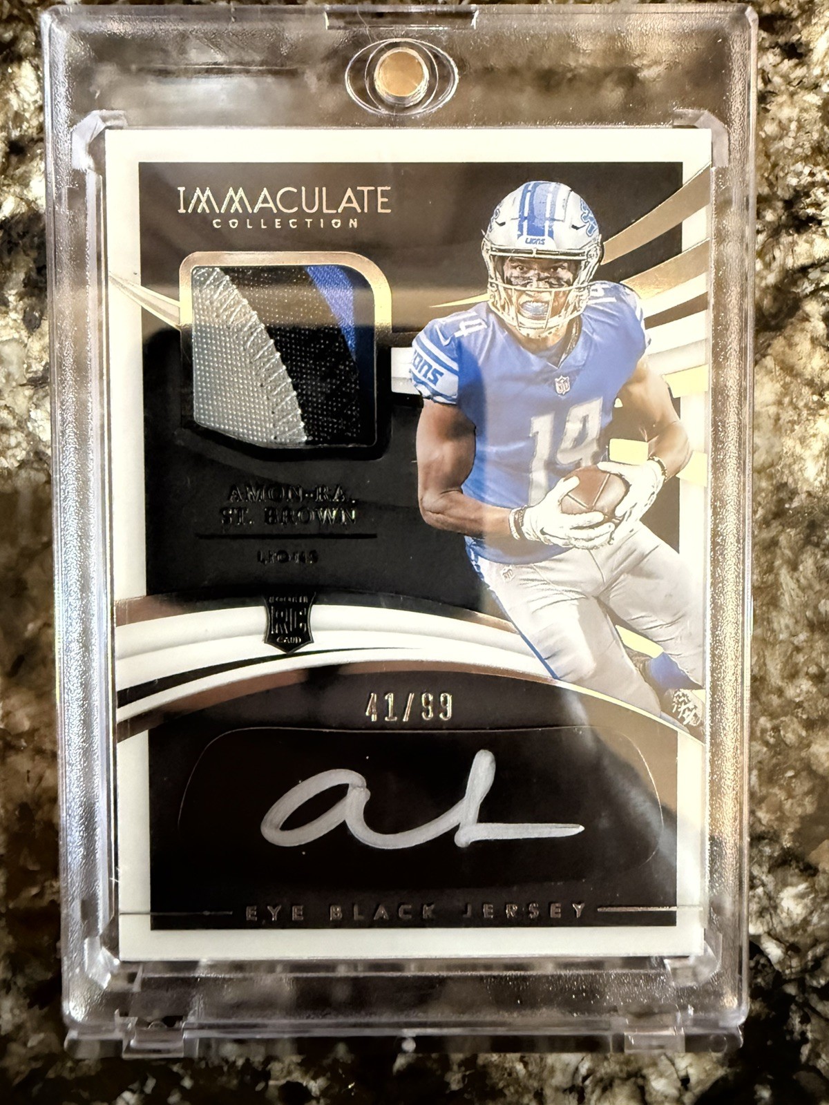 2021 Panini Immaculate Amon-Ra St. Brown Rookie Eye Black RPA /99 #REB-ASB Lions