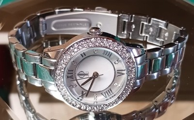 Jennifer Lopez ladie's watch w/crystal-accented bezel and a silver-tone bracelet
