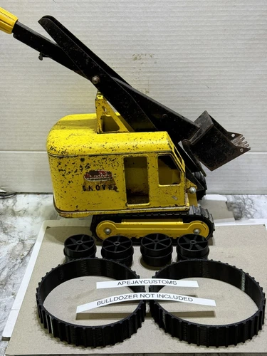 1 new set of tracks and 4 wheels to fit Tonka Steam Shovel Excavator