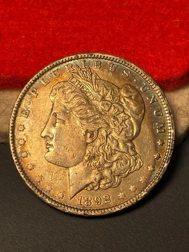 (#102575) Morgan Dollar:  1892.  AU details.  Amazing toning. (See video!)