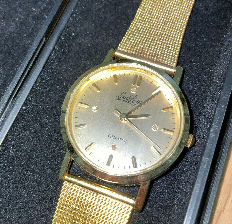 Louis quartz gold best sale & silver wrist watch