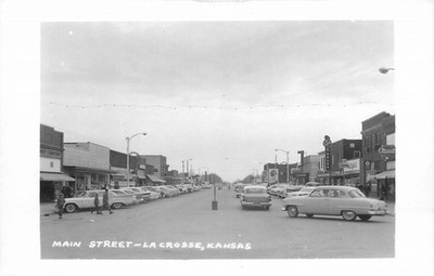 Main Street La Crosse Kansas RPPC Vintage 1950s Car Street View Postcard