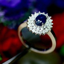Oval Cut Blue Sapphire White CZ Halo Style Ring in 925 Silver For Womens.