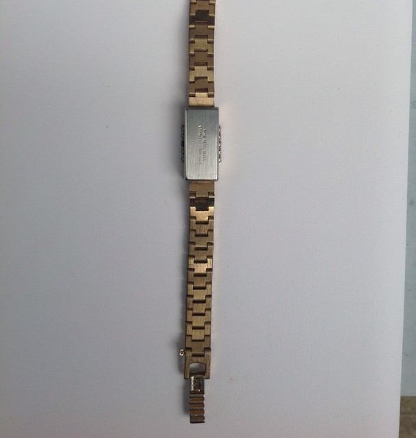 Arriba 91+ Foto Base Metal Bezel Stainless Steel Back Mirada Tensa