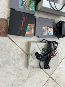 Nintendo NES Console Lot with Controllers, Taito Arkanoid, Super Mario Bros.