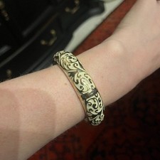 Vintage Gold Tone White Enamel Bangle Bracelet with Swirl Design