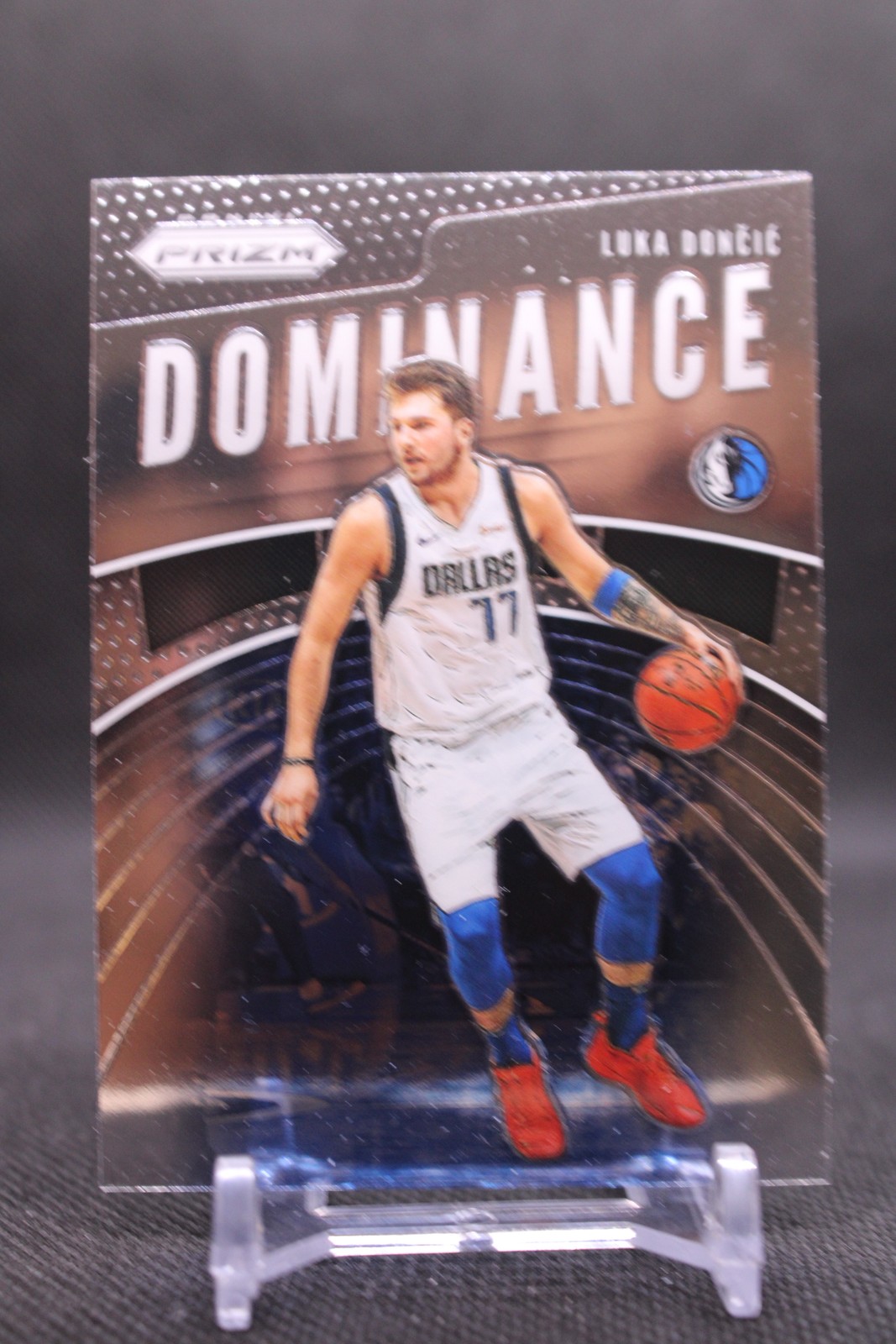 Luka Doncic #20 Basketball Cards 2019 Panini Prizm Dominance trading card — raw and PSA graded price guide