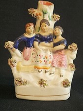 A 19thC Staffordshire Figural Group of Three Children Spill Vase, C1850