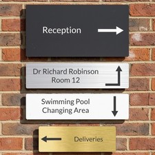 Engraved Directional Sign with Arrow Pictograms, Gold, Silver, Black or White.
