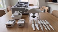 DJI Phantom 4 Drone Quadcopter W/ Remote Extra Blades, 2 Original Batteries