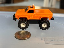 Schaper Stomper Orange Ford 4x4 Pickup