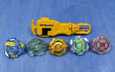 Lot of Beyblade Burst Tops  Hasbro Gold String Launcher/Grip Assortment