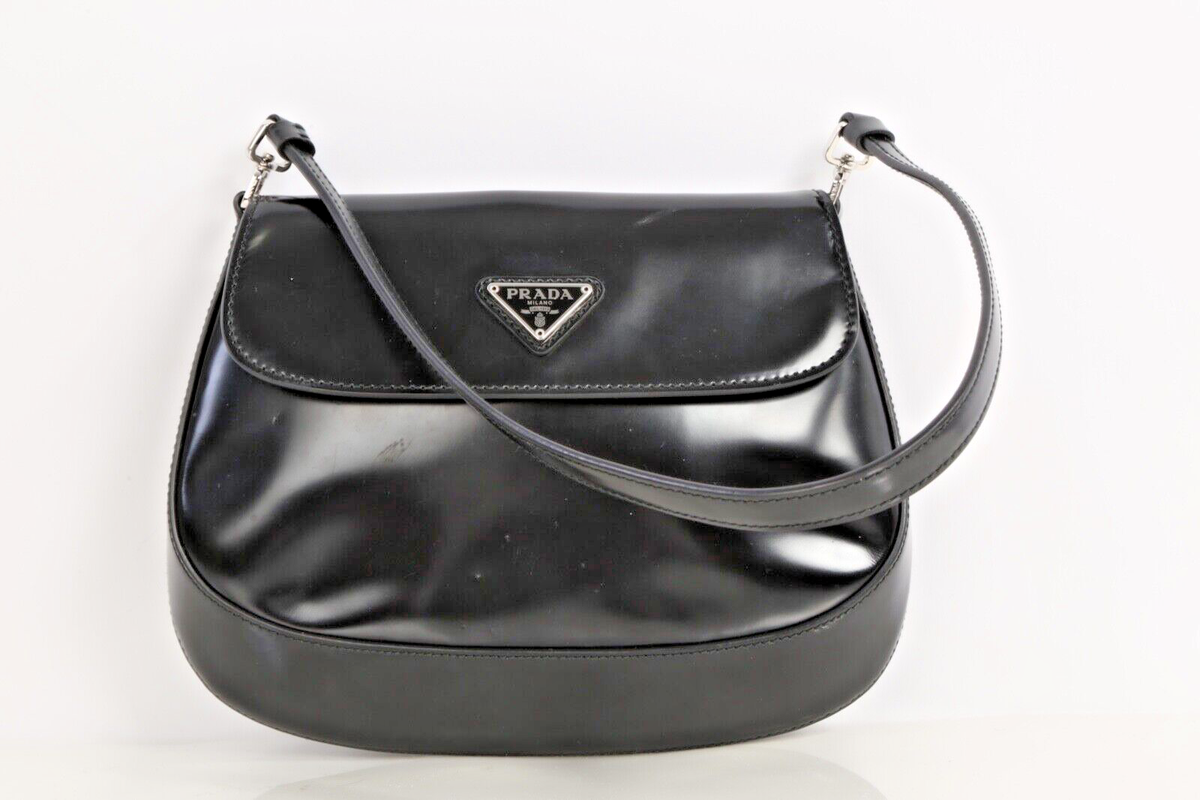 PRADA ブラックレザーブローチ s-l1200.png