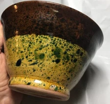 Studio Pottery deep bowl Pumpkin color inside; multi-color speckled  1999 LDD P