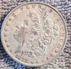 1878 Morgan silver dollar (circulated, ungraded)