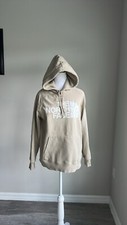 The North Face women  s beige white pullover hoodie