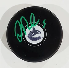 TUCKER POOLMAN SIGNED VANCOUVER CANUCKS NHL HOCKEY PUCK + COA 