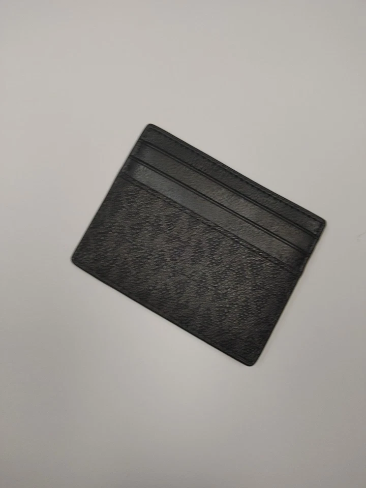 MICHAEL KORS COOPER LOGO TARJETERO ALTO NEGRO GRIS  Foto 2 de 4