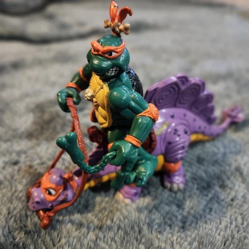 Vintage 1993 Cave-Turtle Mike with Silly Stegosaurus action figure  TMNT