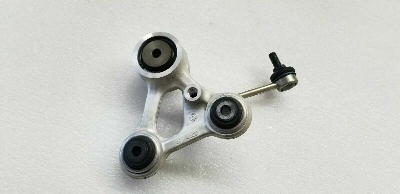LAMBORGHINI AVENTADOR REAR SHOCK ARM MOUNT LEVER OEM 470513127