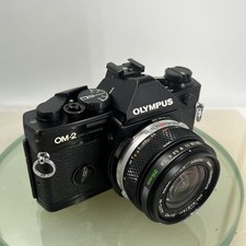 Olympus OM-2 fotocamera reflex spot/programma + Olympus Zuiko 28 mm f2.8 TESTATA #883