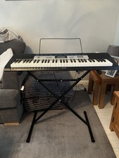 Casio LK-136 Electronic Keyboard with illuminated keys and stand