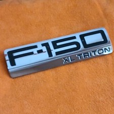 FORD F150  Lariat 5.4 Triton TRUCK Emblem  2004 - 2008 OEM 5L34-16B114-PA