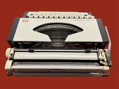 Vintage Olympia AEG Traveller De Luxe S Typewriter With Its