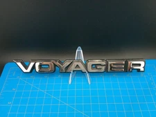 OEM Chrysler Voyager Rear Emblem Badge Nameplate 55199915 Minivan Vintage 90s