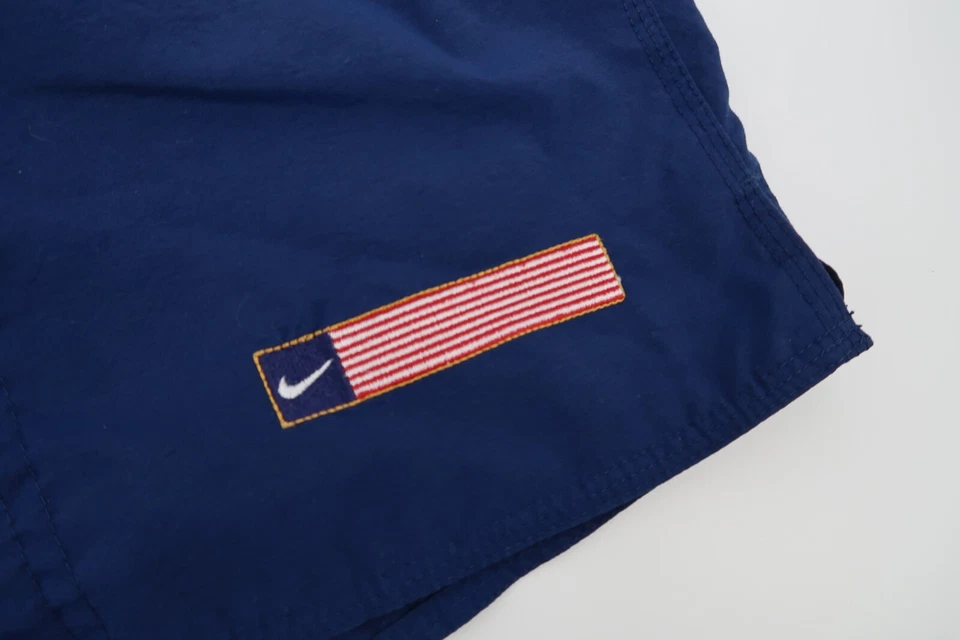 Bermuda de corrida vintage Nike masculina XL branca etiqueta azul bandeira americana tênis de natação - Imagem 3 de 4