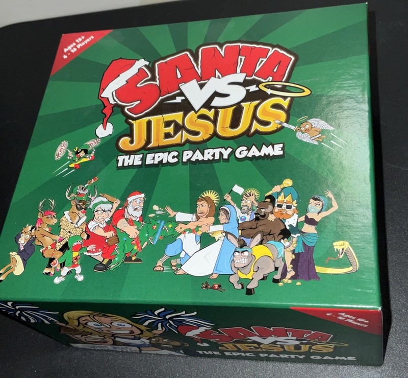 Santa VS Jesus The Epic Party Game 4-16 Players Komo Games Complete
