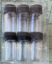 1 inch glass bottles in acrylic box 18 bottles total with lids