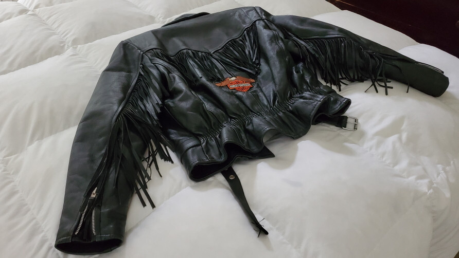 First genuine leather Woman's Size 12 biker jacket with tassels, Harley