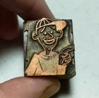 Vintage Letterpress Printing Block Man Wearing Baseball Hat Pointing Finger