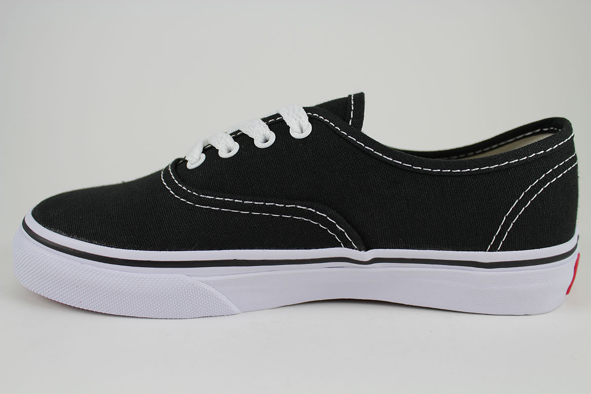 black and white vans on girl
