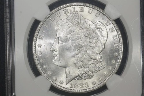 1883 Morgan Dollar,  NGC MS-65
