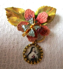 ANTIQUE CATHOLIC BROOCH ST THERESE OF LISIEUX WITH MEDAL AND FLOWER