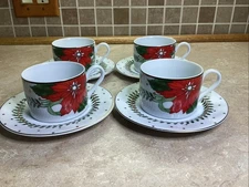 SET OF 4- AMERICAN ATELIER SUZANNE EVANS POINSETTIA  CUPS AND SAUCERS