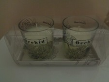 NEW SET OF TWO MEDIUM SIZE ORCHID SCENTED CNADLES 