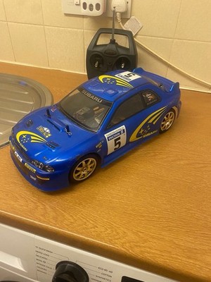 Tamiya Subaru Impreza Rallye Auto Maßstab 1:10 ferngesteuert Allrad