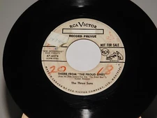 The Three Suns HAUNTED GUITAR / THEME FROM THE PROUD ONES 45 RPM RCA Promo