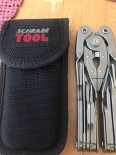 Gebrauchte neuwertige Schrade robuste Multitool-Zange mit schwarzer Nylonscheide