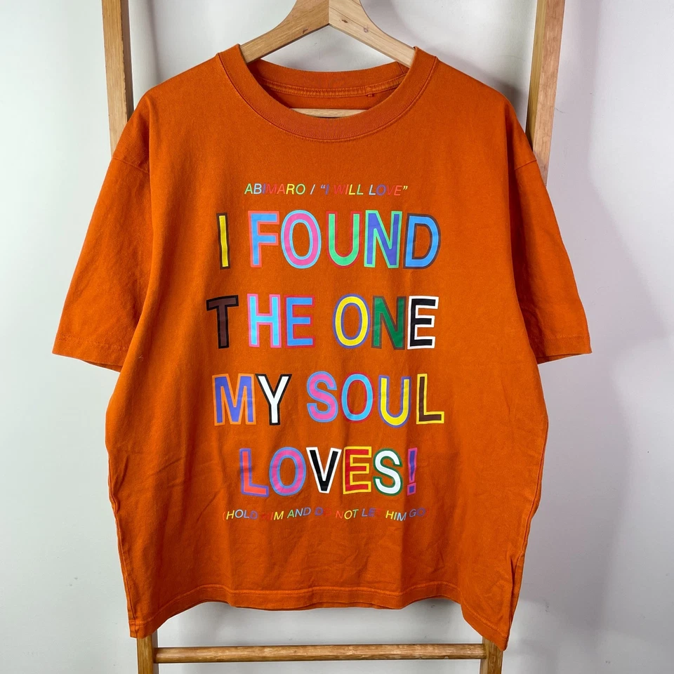 Uniqlo Lakwena Shirt Mens Large Orange Graphic Print Short Sleeve Crew Neck